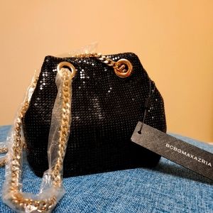 NWT BCBGMAXAZRIA Black mesh purse.